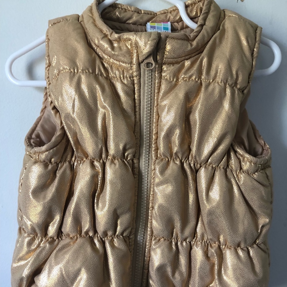 Gold shiny Toddler Puffer Vest. Zip up.